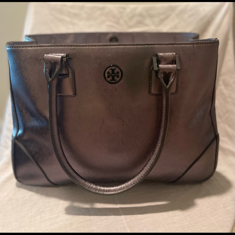 Grey/Silver Tory Burch leather two handle tote/satchel. Three inner pockets.
